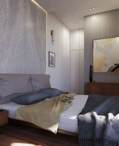 Modern minimalist bedroom featuring a textured marble headboard wall designed by a professional interior designer.